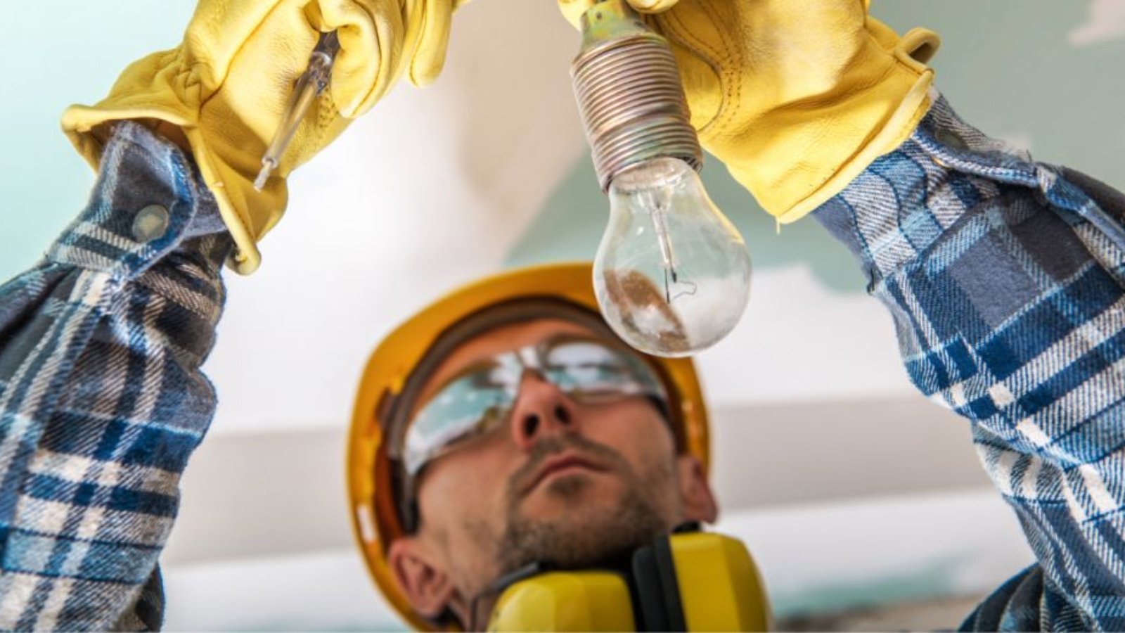 electrician-checking-cables-in-a-lighting-system-t-Y4JEKZQ 1 (1)