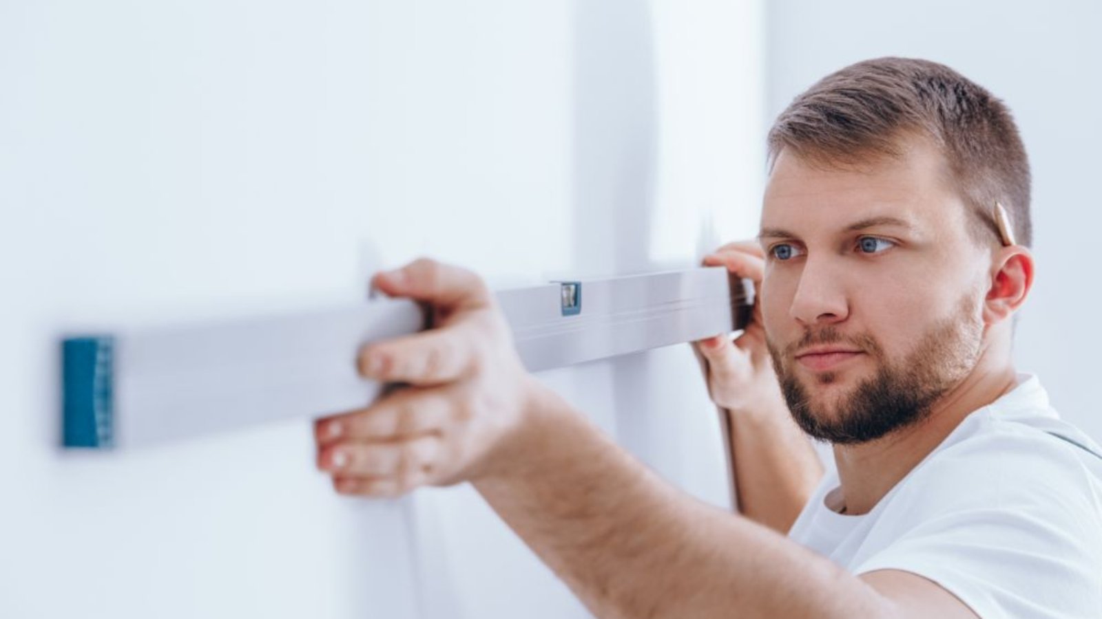 worker-checking-the-wall-PANFFWC 1